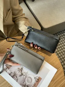 Genuine leather wristlet wallet for women, large capacity long phone clutch bag with zippers.