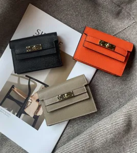 Compact genuine leather card holder wallet with classic turn lock design in multi colors