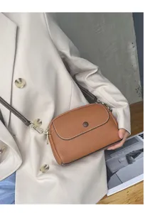 Stylish genuine leather women shoulder crossbody bag, premium brown top layer cowhide design.