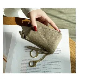 Genuine leather coin purse and key pouch for women with zipper and chain, soft cowhide.