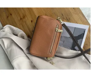 Brown genuine leather shoulder crossbody bag with zipper pocket and metal hardware details