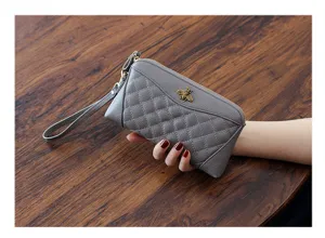 Grey quilted genuine leather long wallet with wrist strap and vintage bee metal emblem.
