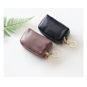 Kompakte Mini-Brieftasche aus echtem Leder mit Doppelreißverschluss und praktischem Schlüsselring.