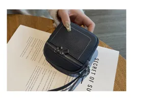 Kompakte Mini-Brieftasche aus echtem Leder mit Reißverschluss für Lippenstift Schlüssel.
