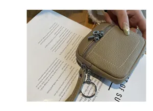 Echtes Leder Mini Münzgeldbörse, süße Kopfhörer Lippenstift Tasche mit Schlüsselanhänger.