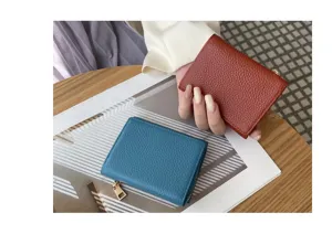 Detail view of mini trifold genuine leather women wallet showing textured surface and zipper pocket