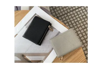 Detailed view of the women short trifold genuine leather wallet with zipper coin pocket stylish.