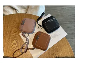 Kleine Echtschlüssel-Geldbörse Lippenstift Kopfhörer Tasche mit Handschlaufe Schlüsselbund