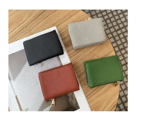 Compact genuine leather trifold women's wallet with coin pocket, stylish mini purse in multi colors.
