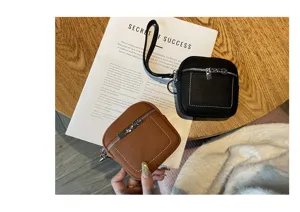 Echtes Leder Mini Münzgeldbörse kompakte Kopfhörer Tasche Schlüsselanhänger kleines Portemonnaie.