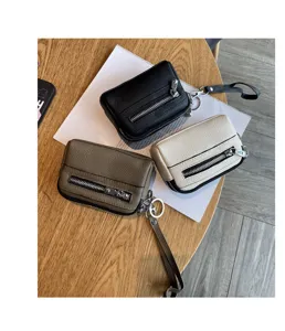 Women mini genuine leather coin purse double zipper clutch handbag with wrist strap.