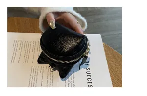 Genuine leather coin purse for women, compact small black mini wallet, cute design minimalist style.