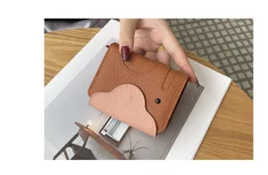 Genuine leather elephant card holder for women, cute multi-slot bifold slim wallet.