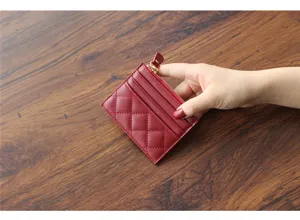 Red quilted card holder wallet, miniature zippered PU leather purse for women daily use.