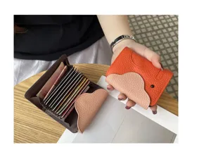 Genuine leather elephant card holder with multiple slots, lightweight cowhide mini wallet.