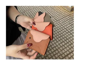 Elephant leather card holder detail, multi-slot slim cowhide wallet multi-color display.