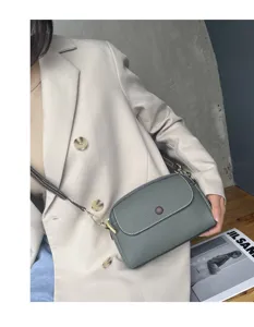 Genuine leather crossbody shoulder bag for women, stylish daily handbag with adjustable strap.