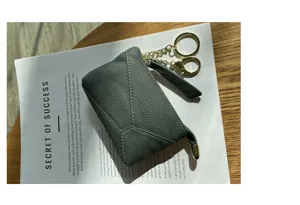 Grey genuine soft cowhide leather coin purse with zipper closure and practical double key ring chains.