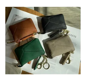 Genuine leather coin purse detail showing multi-color soft cowhide zipper card and key wallet.
