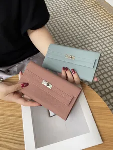 New leather long wallet for women, elegant top layer cowhide clutch purse with turn lock.