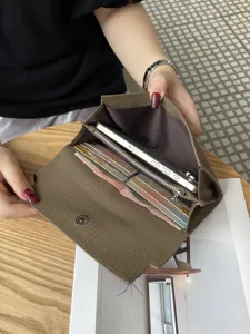Genuine leather long wallet for women, multi-functional cowhide clutch purse and phone bag.