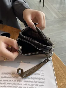 Women's genuine leather mini double zipper wrist coin purse clutch bag main view