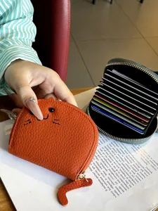 Cute cat shape orange coin purse wallet with multiple card slots and zipper closure for women.