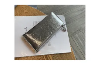 Zilveren metallic lange lederen portemonnee voor dames stijlvolle rits clutch tas.