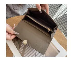 Women's genuine leather long wallet, brown pebbled texture, multi-card slots and zipper pocket.