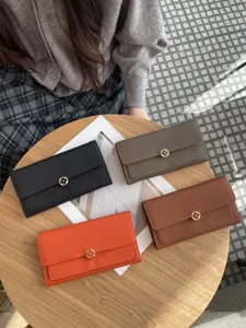 Women's genuine leather long wallet, elegant envelope clutch purse with flower metal clasp.