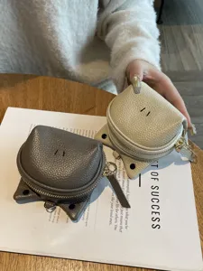 Genuine leather cute animal coin purse for women, portable small wallet with zipper closure.
