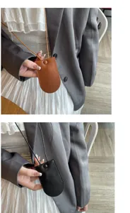 Pocchetta per chiavi minimalista in vera pelle da appendere al collo, ciondolo borsa mini di tendenza.