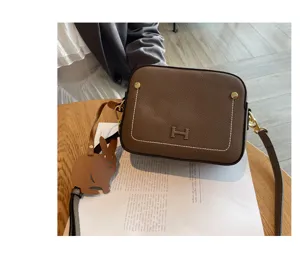 Genuine leather shoulder bag women 2026 new fashion small square camera bag brown purse