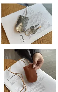 Elegante astuccio per chiavi da collo minimalista in vera pelle mini ciondolo borsa chic.