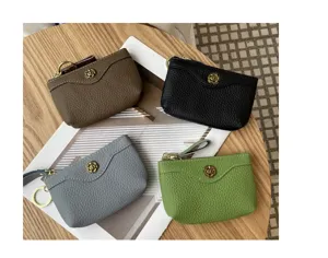 Genuine leather coin purse detail view showing stylish mini cowhide card holder features.