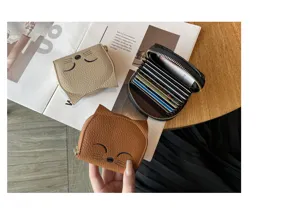 Cute leather card holder for women, slim accordion wallet with multiple slots, compact design.