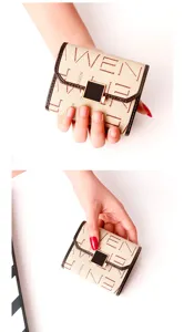 Detail view of a compact beige wallet with brown edges and chic letter prints for daily use.