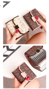 Compact accordion card holder for women, multiple card slots, stylish short wallet.