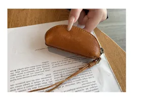 Mini genuine leather coin purse with strap, vintage vegetable tanned leather small pouch for keys.