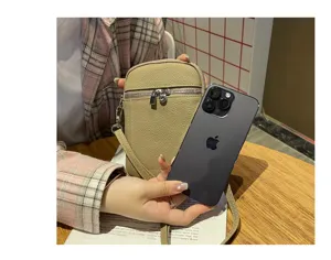 Genuine leather phone bag mini crossbody bag for women, stylish detail shot showing compact size.
