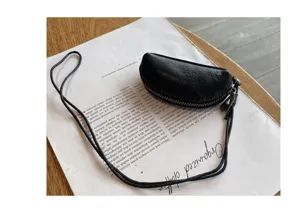 Black genuine leather mini coin pouch with lanyard, small zipper lipstick bag.
