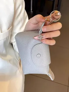 Mini leather coin purse keychain pouch for women, cute small hanging wallet grey design.