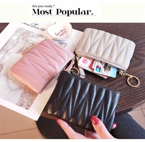 Compact women mini leather coin purse with zipper short card holder stylish wallet with key chain.