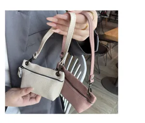 Genuine leather mini coin purse for women, soft top layer cowhide wristlet bag with zipper.