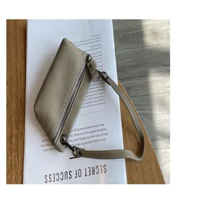 Genuine leather mini coin purse for women, top layer cowhide small zipper change pouch.