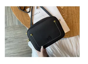 Black genuine leather crossbody shoulder bag with gold hardware and H logo design.
