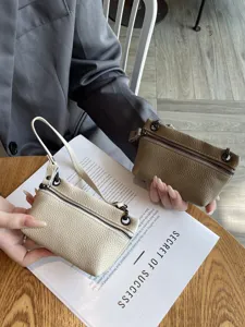Genuine leather mini coin purse with zipper closure, stylish small pouch for women daily use