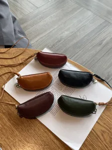 Genuine leather coin purse mini key holder vintage cowhide neck hanging pouch bag for women.