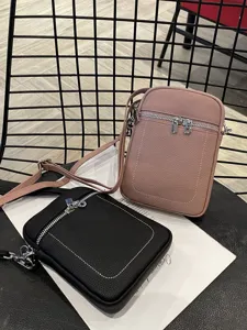 Genuine leather mini crossbody phone bag for women, casual small shoulder bag daily use.