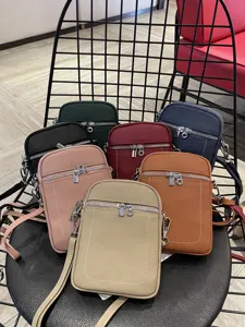 Genuine leather mini crossbody phone bag for women, stylish multi-color casual shoulder bag.